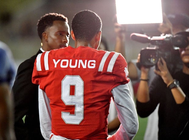 Bryce Young enjoying the bright lights after an exciting game. 