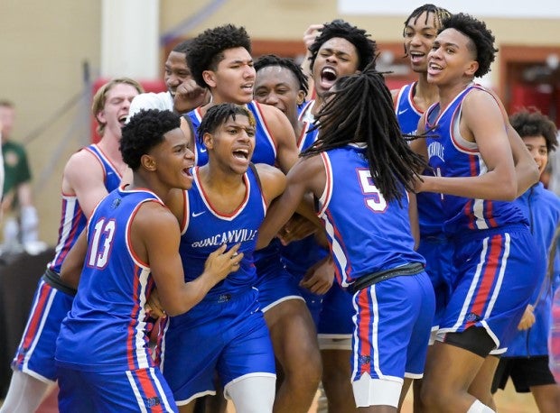 Duncanville celebrates its buzzer-beating 67-66 win over Montverde Academy.