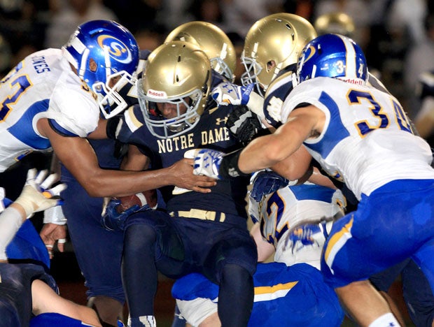 Serra's defense, shown earlier this season bottling up Notre Dame-Sherman Oaks, was even better Saturday, holding Bellarmine to 87 total yards in a 28-14 victory to give the Padres a co-WCAL championship. 
