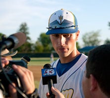 Coach Justin Dehmer talks to press
after breaking Iowa record for
consecutive wins. 