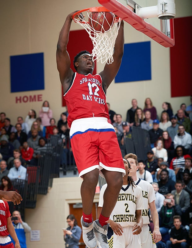 Zion Williamson finishes a two-handed dunk during Thursday night's game against visiting Asheville Christian Academy.