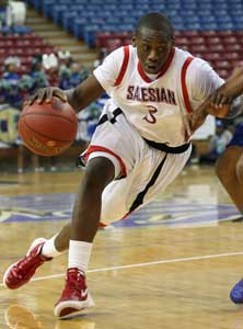 Mario Dunn goes hard to the basket
for Salesian. 