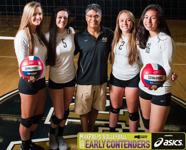 Archbishop Mitty head coach Bret Almazan-Cezar (center) is surrounded by players (left to right) Merin Kolte, Lauren Speckman, Lauren Lux and Kamrin Caoili. 