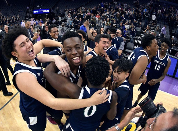 Onyeka Okongwu (middle of celebration) won three state titles — and a mythical national crown — in four years playing for Chino Hills (Calif.). 