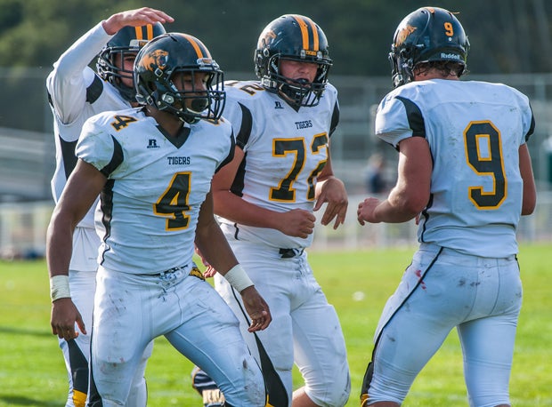 Nick Pierotti (9) celebrates a good play on the field from a game earlier this season.
