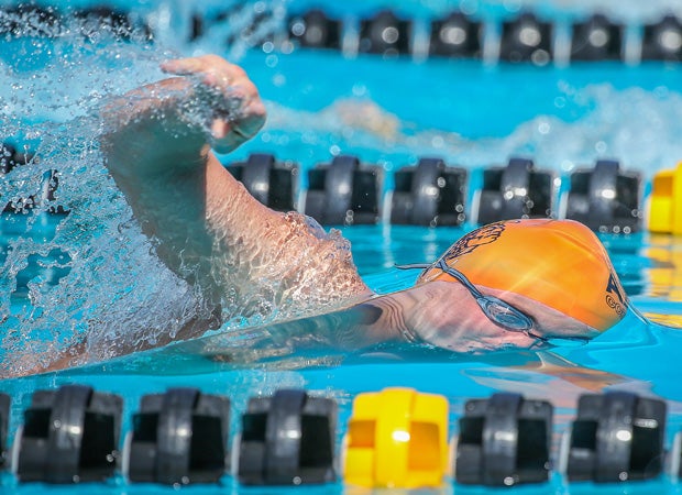 Corona del Sol (Ariz.) swimmer Dylan Edge competes in the varsity boys 400 freestyle relay event during the Wolves Classic Invitational.