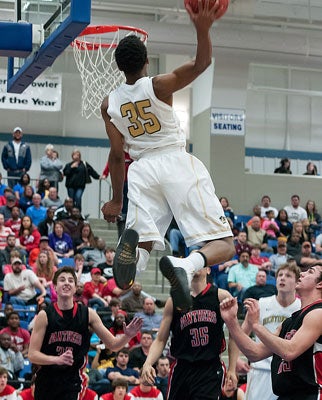 Malik was deemed the "God of Dunk" after this giant ally-oop dunk during last Friday's quarterfinal playoff victory over Cabot. 