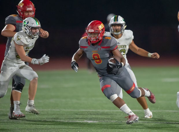 Cathedral Catholic running back Zavien Watson (9) leads his team into big game with St. Augustine (San Diego) on Friday.