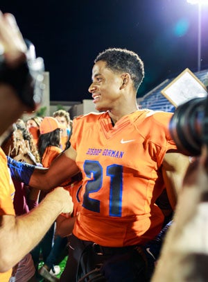 Cordell Broadus soaks it all in following Friday's
win over Brophy Prep.