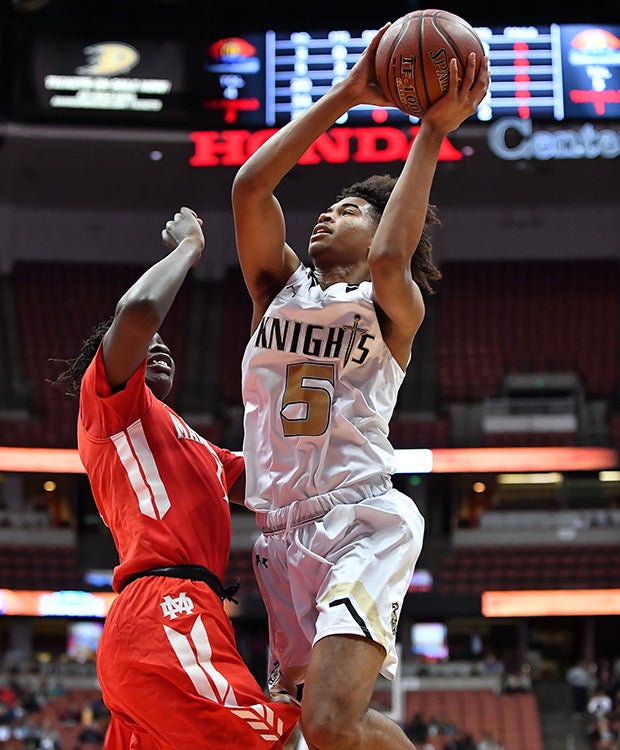 Bishop Montgomery guard Ethan Thompson drives to the basket against Bol Bol.