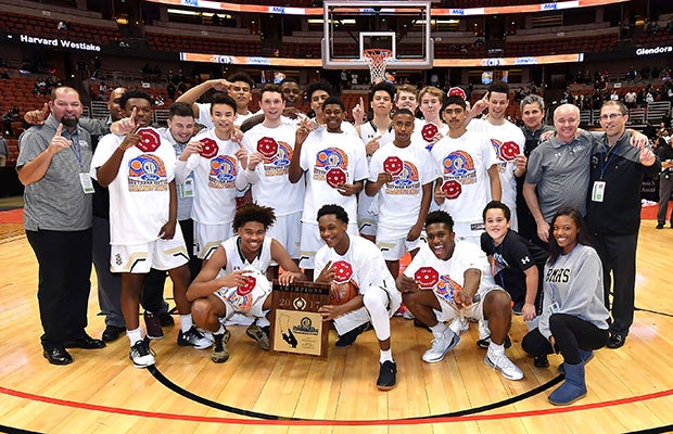 Bishop Montgomery poses for a team photo following their victory over Mater Dei in the Open Division championship game Saturday night at the Honda Center.