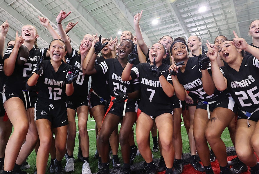 The Robinson flag football team celebrates its 10th consecutive FHSAA state championship after a 42-34 victory over Northwestern. (PHOTO: Francis Fedor)