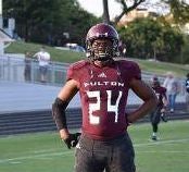 Football player dies shielding three girls from gunfire