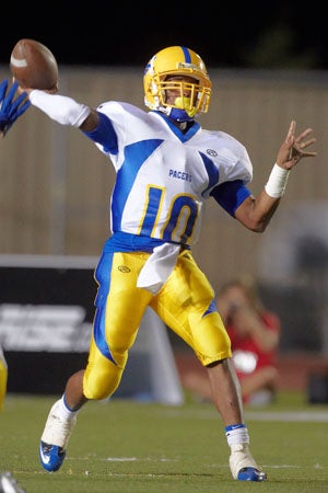 Quarterback Terry Shine sparkled in his varsity debut.