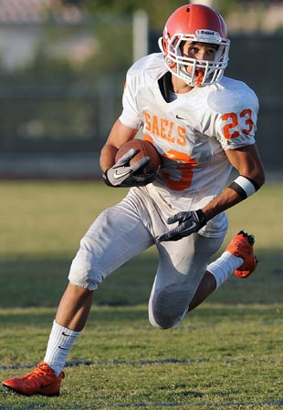 Biaggio Walsh running last season with the
freshman team.
