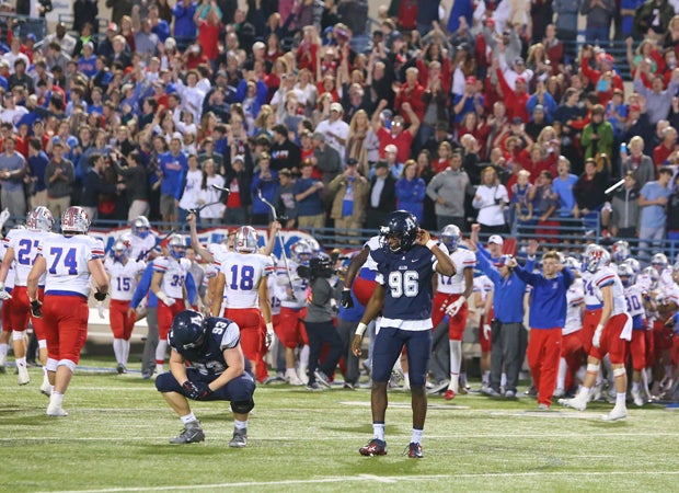 Allen players are left dejected as Westlake players and fans celebrate during the closing seconds of the game.