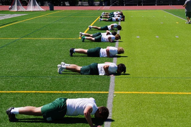 De La Salle players trained 11 at a time with a coach on Monday in first day of conditioning.