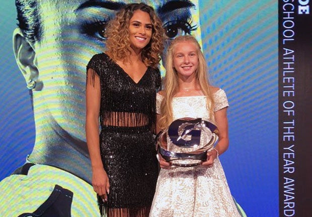 Katelyn Tuohy won the Gatorade 2017-18 female Athlete of the Year award last July. She poses with two-time winner Sydney McLaughlin.