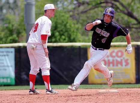 Holy Family and ace Zach Trombley (4) are running toward their second consecutive Class 3A state championship. In the double-elimination format, the Tigers are undefeated as they open play Friday against Lamar in Greeley.