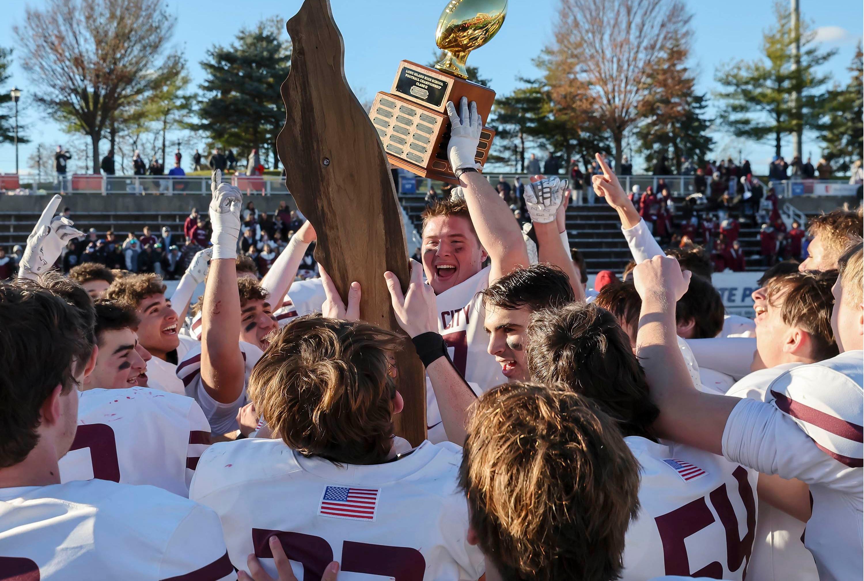 Seen here celebrating another undefeated season and championship last season, Garden City suffered its first loss in nearly seven years Monday night. (FILE PHOTO: Ray Passaro)