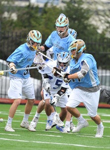 The Haverford defense swarmed Darien
throughout the rain-soaked contest.