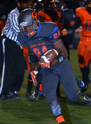 Russell Booze rushes for Bishop Gorman's firsttouchdown of the night.