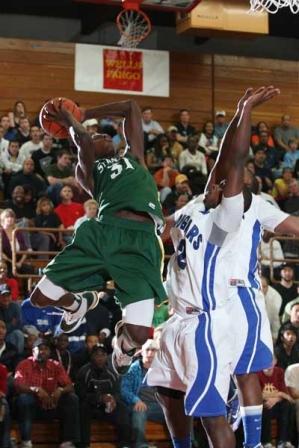 Michael Gilchrist winds his way to the rim.