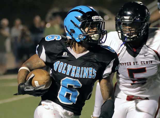 Harry Randall and Woodland Hills will play Central Catholic at Heinz Field.