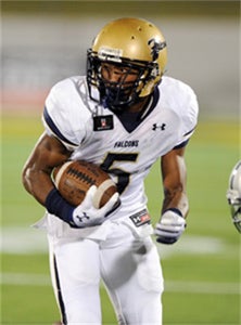Good Counsel star receiver and
cornerback Kendall Fuller mixed
it up with IFA champions Forrest
Griffin and Chuck Liddell on
Thursday.
