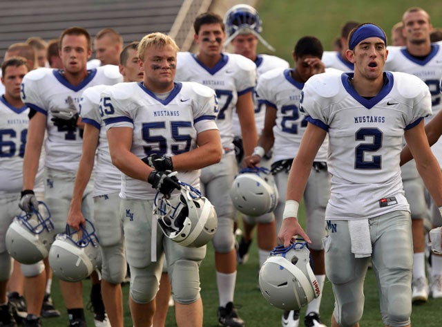 The Millard North football program, shown here in 2011, posted just four wins that season. This year, though, the team is back to defend a state title.