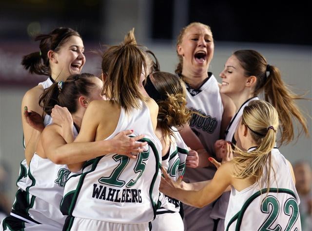 Kentwood celebrates a Washington 4A title on Saturday.