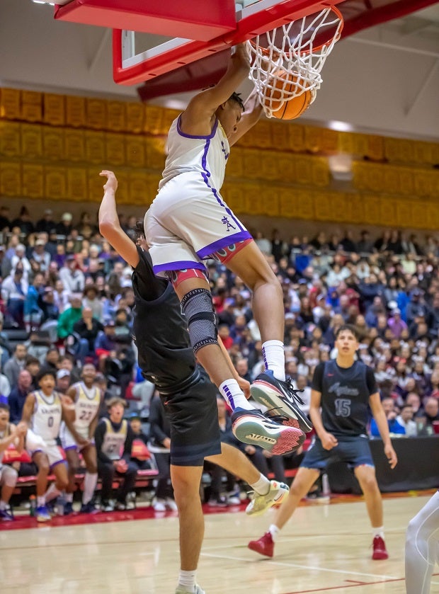 St. Augustine's Derrius Carter-Hollinger goes up for a dunk in the Saints' 85-53 win over Montgomery in the San Diego Section Open Division finals on Feb. 25. (Photo: Rudy Schmoke)