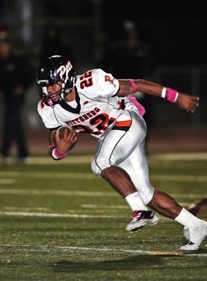 Pittsburg senior running back Harris
Ross likes to run both on the inside
and outside.