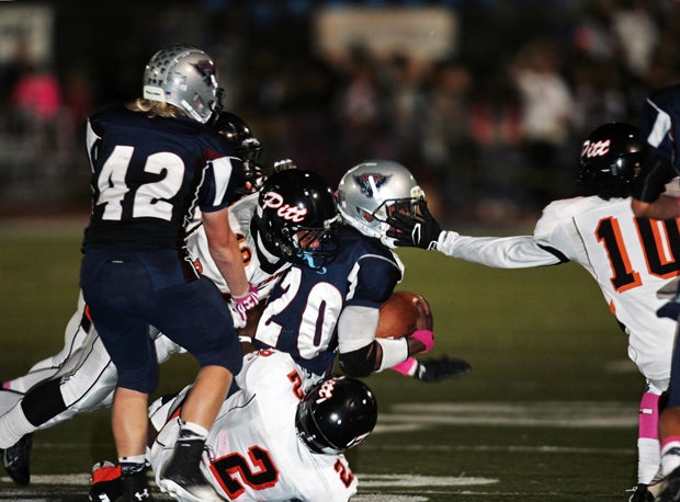Freedom's Joe Mixon, California's top recruit overall from the Class of 2014, was held in check all night by a stingy Pittsburg defense during the Pirates' 34-13 Bay Valley Athletic League win in Oakley on Friday night.