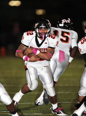 Even with a big lead, Harris Ross
clutches the ball tightly.