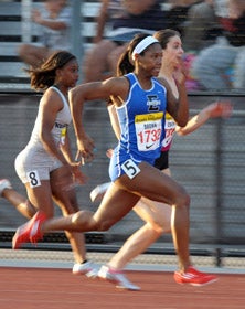 Aaliyah Brown winning the 100 at
the Arcadia Invitational.