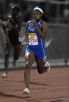 Aaliyah Brown winning the 200 at
the Arcadia Invitational.