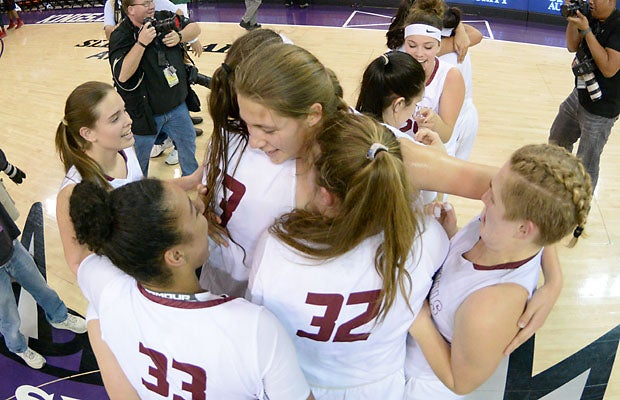 Cardinal Newman celebrates its first state title with rugged 39-37 win over Antelope Valley at Sleep Train Arena Saturday.