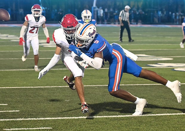 Jett Washington separates a receiver from the ball with a big hit during an August win over Kahuku of Hawaii. (Photo: Heston Quan)
