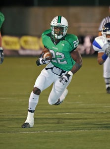 Tre Newton, one of finest running backs
in the history of Texas high school
football, quit the game in November due
to excessive concussions. Newton, shown
here as a prep star for Southlake Carroll,
was a sophomore at the University
of Texas when he gave up the game.