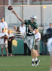 The long and big arm and eventually
legs of Bart Houston helped bail
out the Spartans.