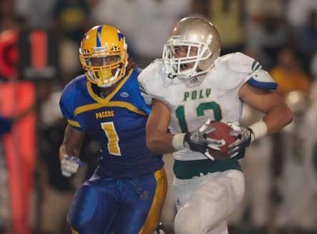 Long Beach Poly's Manusamda Luuga outraces Grant High's Shaq Thompson Saturday.