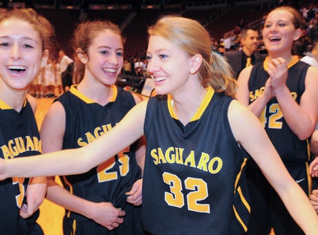 Kaitlyn Quinn (32) was in the middle of Saguaro's joyous celebration of its first state title.