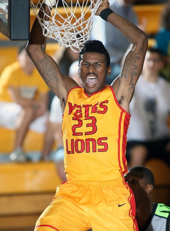 Melvin Swift, Yates, had 14 points and this dunk in an 87-84 loss to Oak Ridge.
