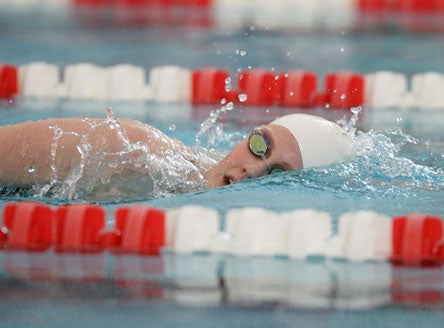 Franklin set a pair of pool records Saturday for Regis Jesuit, finishing the 200-yard freestyle in 1:51 and the 100 backstroke in 54.54 seconds.