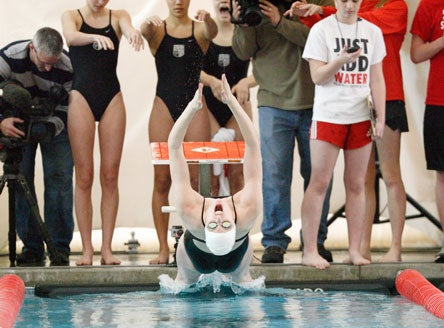 Missy Franklin is a contender for the 2012 London Olympics. But on Saturday, the emerging national star was back to just being a regular high school swimmer for Regis Jesuit.