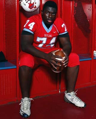 Dominic Woods, roughly 300 pounds, is one of the youngmen responsible for protecting Kincade.