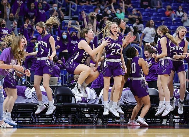 Canyon (Texas) players celebrate wildly as the final seconds countdown in their victory over Hardin-Jefferson in the UIL Class 4A state championship game at the Alamodome in San Antonio.