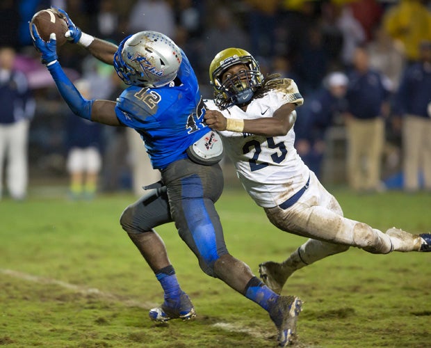 Byrnes receiver Jaylan Foster makes a catch in front of Spartanburg defensive back Trey Smith.