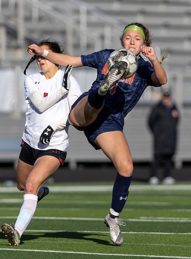 Two players battle for the ball during a recent match between Tyler Legacy and McKinney North played during the Forney Lady Rabbits Invitational Tournament. (Photo: Robbie Rakestraw)